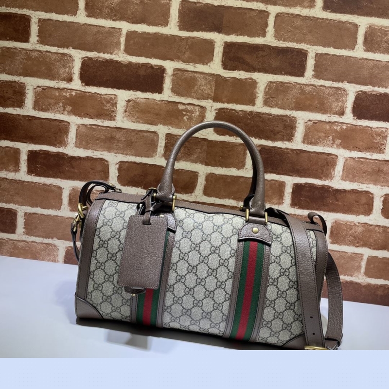 G*u*i top handle bags